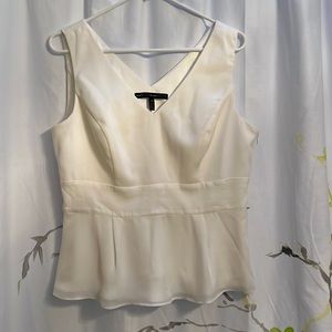 Off-white peplum shell with the satiny underlayer and I share outer layer